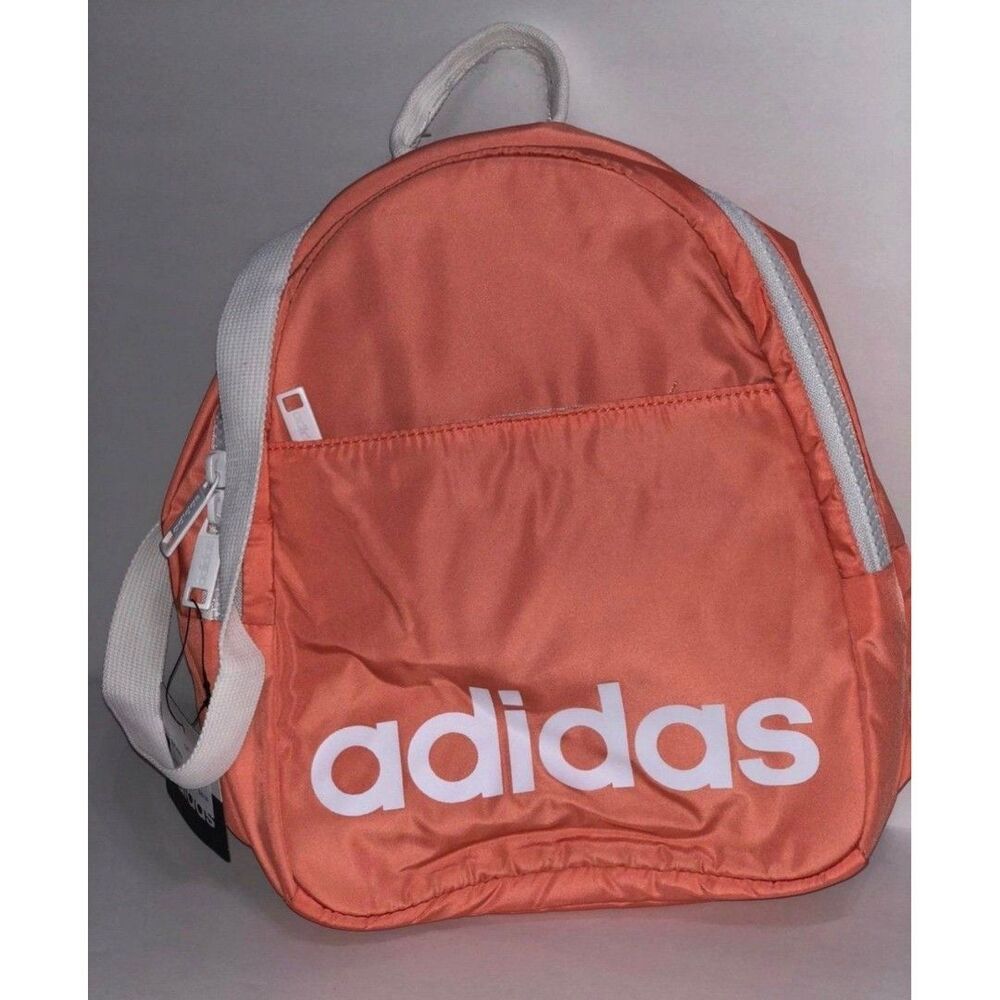 Adidas Mini backpack peach colored with white accents B36